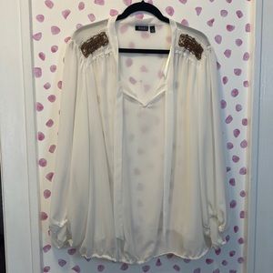 White Blouse with Bronze Shoulder Embellishments. V Neck with Bow Tie Strands